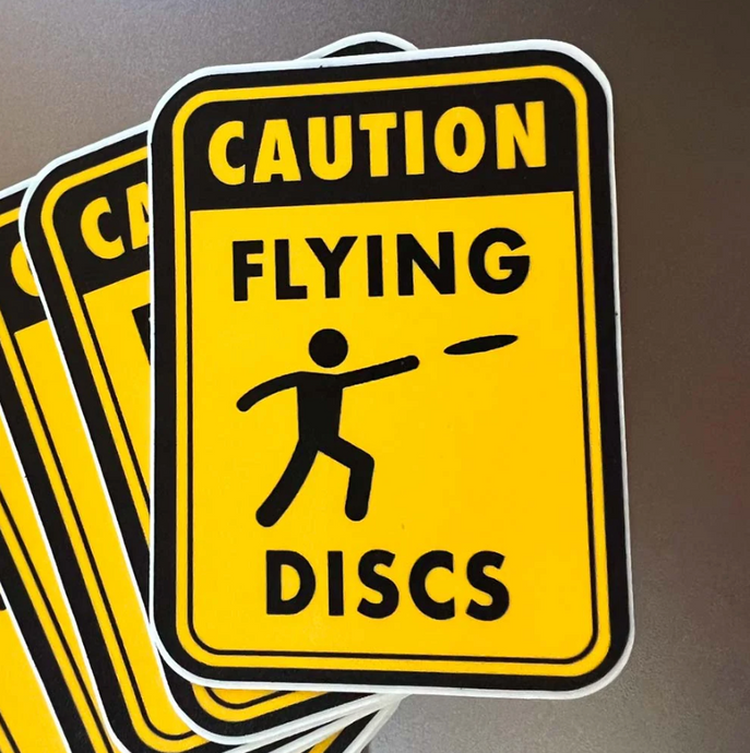 Caution Flying Discs Sticker